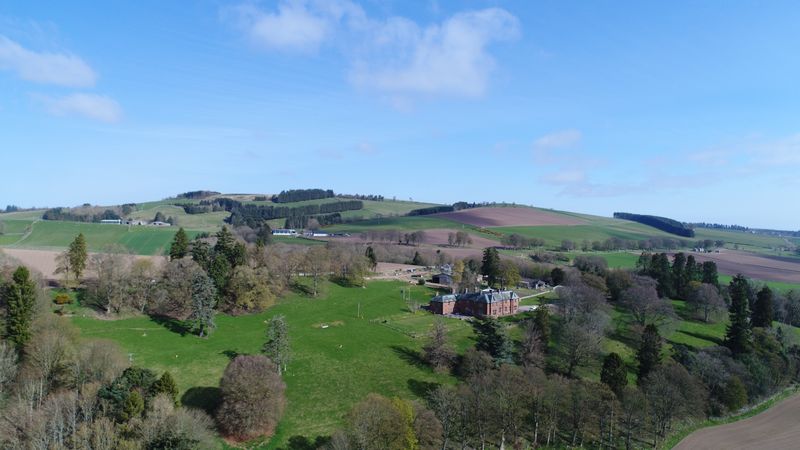 Park Hill house among trees and open fields